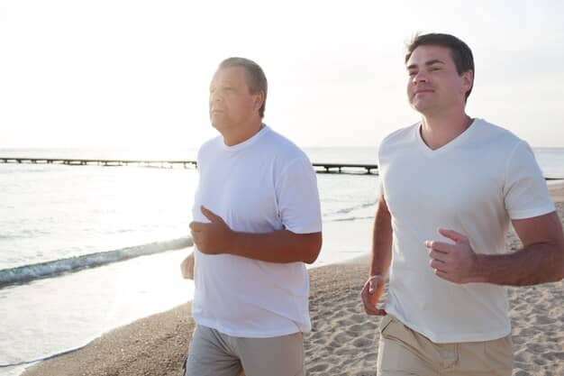 Two men, one in his late 20s and another in his early 40s, are jogging together in a park. They are laughing and appear to be engaged in a friendly conversation, symbolizing that health issues like ED can affect men of different age groups.