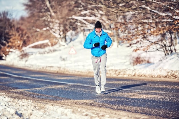 A man is depicted exercising outdoors on a crisp, sunny winter day. He is jogging along a snow-lined path, with sunlight reflecting off his face, showcasing a proactive approach to health and well-being. Focusing on his energetic movement and the winter setting.