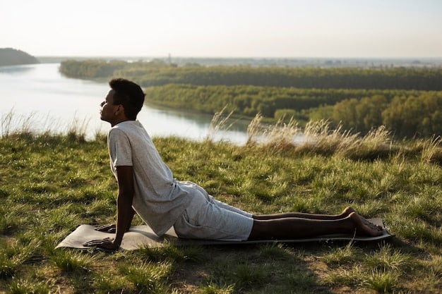A serene image of a man practicing yoga in a peaceful outdoor setting, symbolizing the importance of stress management and mindfulness for overall well-being.