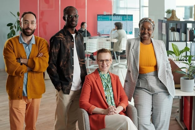 A diverse group of professionals of different ages and backgrounds interacting in a modern office setting, representing the varied demographics undertaking career changes.