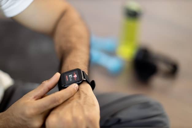 A detailed shot of a smartwatch displaying heart rate zones and exercise duration, with a blurred background of a gym setting, emphasizing technology in fitness.