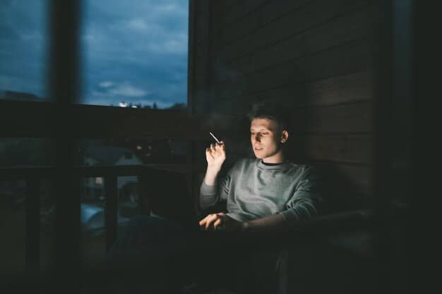A man sitting alone in a dimly lit room, illuminated by the cold glow of a smartphone. His posture is slightly slumped, conveying a sense of isolation or melancholy, surrounded by digital symbols subtly emerging from the screen.
