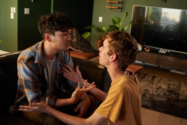 Two men in a support group setting, listening intently to each other, with warm lighting, symbolizing connection and empathy.