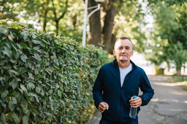 A man in his 40s jogging in a park, representing healthy lifestyle choices for fertility.