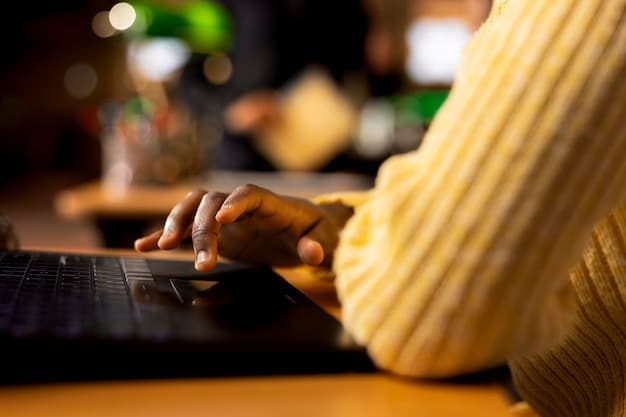 A close-up shot of a person working on a laptop, illustrating the concept of online presence and personal branding. The laptop screen shows a professional website or blog. The environment is a modern, minimalist home office, representing the digital aspect of building a strong personal brand in 2025.