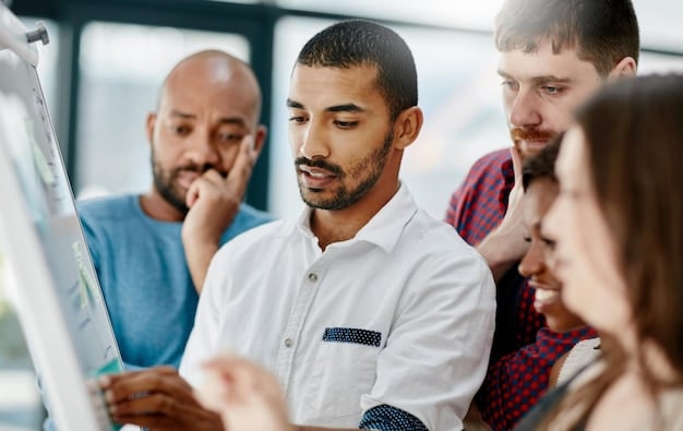 A male immigrant enthusiastically participating in a professional development workshop, surrounded by diverse colleagues, signifying the importance of continuous learning and skill enhancement when Building a Successful Career in the US: Essential Tips for Male Immigrants in 2025.