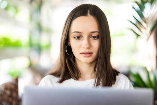 A person using a laptop with a visually appealing LinkedIn profile displayed, showcasing professional headshot, concise summary, and relevant skills, emphasizing the importance of online presence. The image subtly includes graphical elements related to Mastering the Art of Networking: Building Connections for Career Success in 2025.