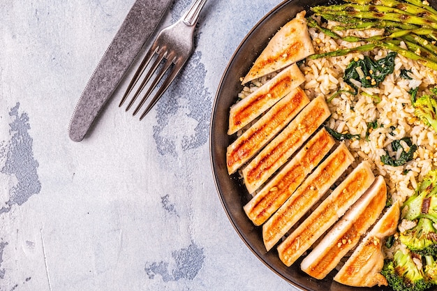 A split image showing a balanced meal on one side (chicken breast, vegetables, brown rice) and a protein shake on the other. The contrast highlights the difference between whole food protein sources and supplements in the context of 'The Truth About Protein Supplements: Are You Wasting Your Money?'.