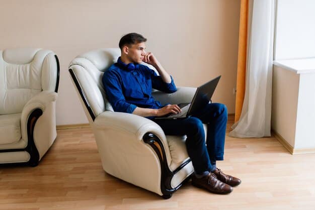 A man sitting comfortably in a chair, eyes closed, hands resting gently on his lap. He's practicing deep breathing, a key element of Mindfulness for Men: 5 Simple Exercises to Reduce Stress in Under 10 Minutes. The background is a softly lit room with calming colors.