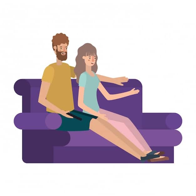 A man and woman sitting on a couch, facing each other, with the man actively listening and nodding attentively as the woman speaks, creating a scene of effective communication while Navigating Relationship Stress: 6 Communication Strategies for Men.