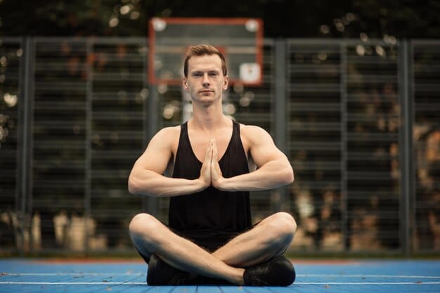 An image showing a man in workout clothes lifting weights, another man meditating peacefully, and a plate of healthy, balanced food, symbolizing the holistic approach to managing low testosterone and mental health.