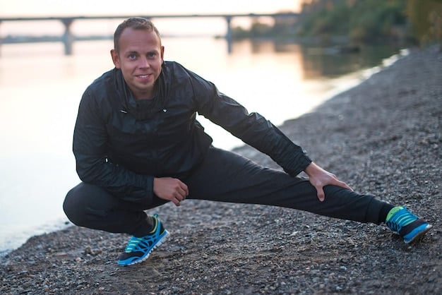 A man in his early 40s, dressed in athletic wear, is stretching in a well-lit living room with a yoga mat. His expression is focused and serene, but he is also glancing at a calendar hanging on the wall. The image conveys finding time for exercise in a busy schedule, highlighting how to make exercise sustainable in the context of men’s mental health.