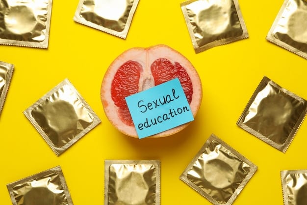 A close-up shot of condoms, lubricants, and an informational pamphlet about STI prevention methods lying on a wooden table, illuminated by natural light. The image is clean, well-organized, and conveys a message of responsibility and sexual health awareness.